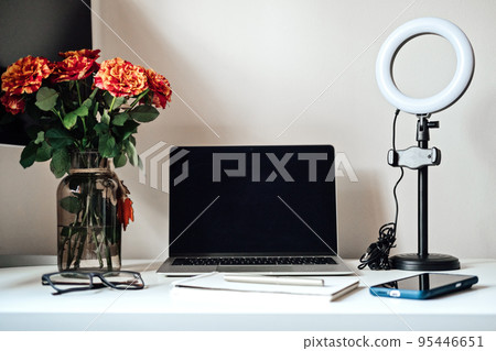 Blogging Equipment. How To Start Blog, Blogging for Beginners. Laptop, Mobile Phone, Ring Light, notebook and glasses on the table 95446651