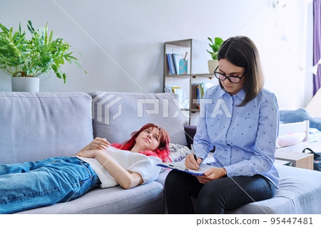 Session therapy of teenage student girl with counseling psychologist 95447481