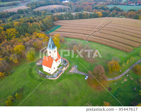 Church of St. James and Philip in Chvojen from above Church of St. James and Philip in Chvojen from above 95447617