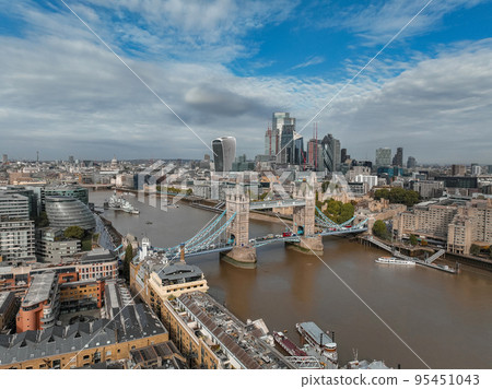 Aerial view of the Tower bridge, central London, from the South bank of the Thames. Iconic symbol of London. Aerial view of the Tower bridge, central London, from the South bank of the Thames. Iconic symbol of London. 95451043
