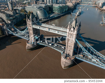 Aerial panoramic cityscape view of London and the River Thames in England, United Kingdom. The iconic Tower bridge - the symbol of London Aerial panoramic cityscape view of London and the River Thames in England, United Kingdom. The iconic Tower bridge - the symbol of London 95451044
