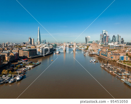 Aerial panoramic cityscape view of London and the River Thames in England, United Kingdom. Aerial panoramic cityscape view of London and the River Thames in England, United Kingdom. 95451050