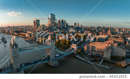 Aerial view of the London Tower Bridge at sunset. Sunset with beautiful clouds over London - the capital of Britain. Aerial view of the London Tower Bridge at sunset. Sunset with beautiful clouds over London - the capital of Britain. 95451055