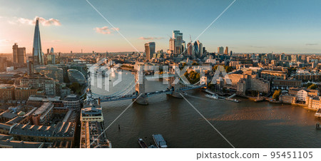 Aerial view of the London Tower Bridge at sunset. Sunset with beautiful clouds over London - the capital of Britain. 95451105