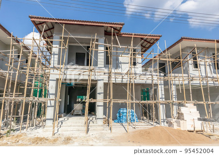 construction residential new house in progress at building site housing estate development 95452004