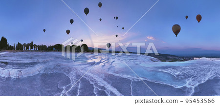 Pamukkale Travertines Cinematic Aerial Drone footage. Turkish famous white thermal bath with healthy clean water in a beautiful sunset. Pamukkale Travertines Cinematic Aerial Drone footage. Turkish famous white thermal bath with healthy clean water in a beautiful sunset. 95453566