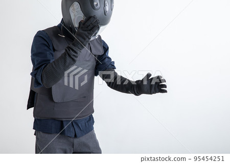 A man wearing a security vest Bulletproof A man wearing a security vest Bulletproof 95454251