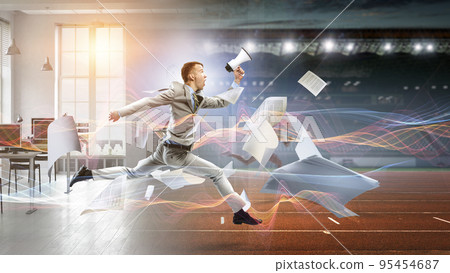 Portrait of energetic businessman jumping in open air Portrait of energetic businessman jumping in open air 95454687