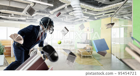 Businessman acting as american football players 95454721