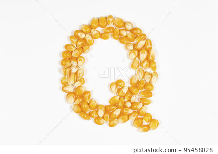 Alphabet Q made from popcorn seeds Alphabet Q made from popcorn seeds 95458028