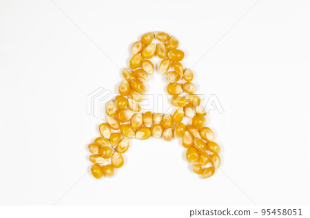 Alphabet A made from popcorn kernels Alphabet A made from popcorn kernels 95458051