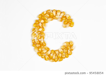 Alphabet C made out of popcorn seeds Alphabet C made out of popcorn seeds 95458054