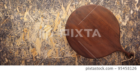 Pizza board onchipboard osb background top table. Wooden cutting board 95458126