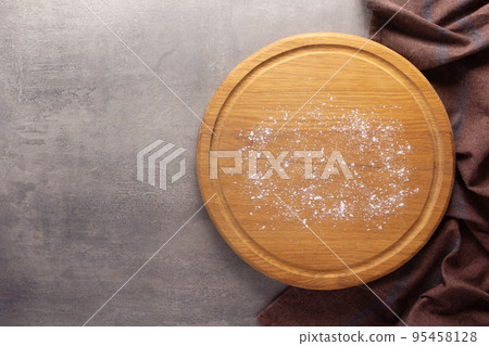 Pizza board on stone background top table. Wooden cutting board 95458128
