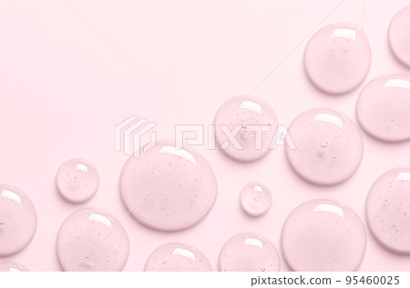 Serum gel texture closeup. Cosmetic product for moisturizing the skin of the face or body. Copy space 95460025