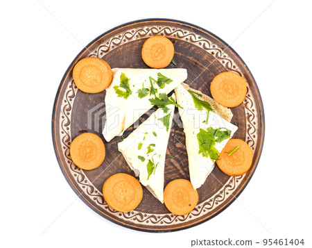 Dish with pancakes on a white background. 95461404