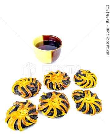 Baking with poppy seeds on a white background. 95461413