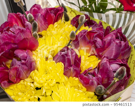 Festive bouquet of red and yellow flowers. 95461513