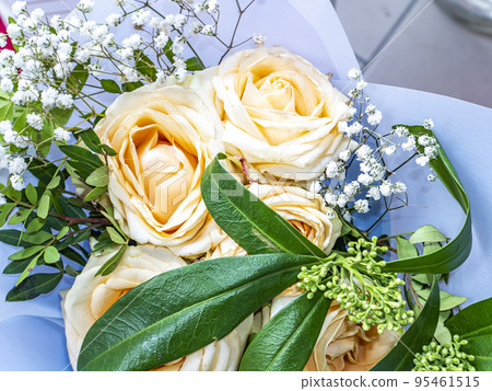 A festive bouquet of cream rose garden flowers. A festive bouquet of cream rose garden flowers. 95461515
