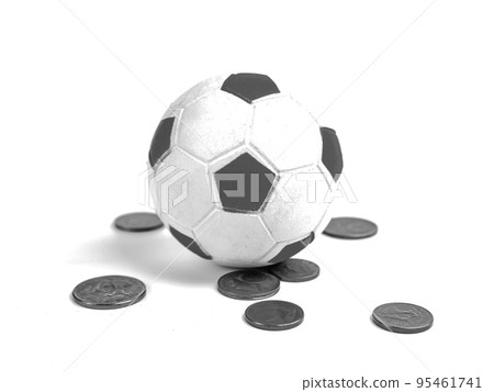 Soccer ball with money on a white background. 95461741