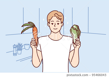 Smiling man holding fresh vegetables Smiling man holding fresh vegetables 95466043
