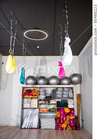 rack with accessories and items for sports in the gym. equipment for fitness. 95466223