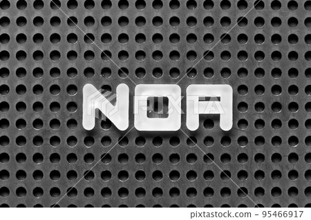 White alphabet letter in word NOA (Abbreviation of Net operating assets, Notice of award or Notification of award) on black pegboard background White alphabet letter in word NOA (Abbreviation of Net operating assets, Notice of award or Notification of award) on black pegboard background 95466917