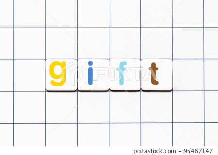 Colorful tile letter in word gift on white grid background Colorful tile letter in word gift on white grid background 95467147