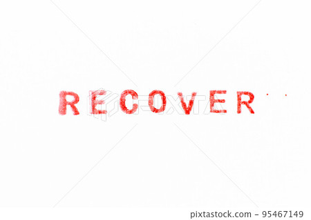 Red color ink rubber stamp in word recover on white paper background 95467149