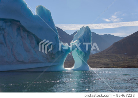 Beautiful landscape with iceberg in Greenland at summer time. Sunny weather. Beautiful landscape with iceberg in Greenland at summer time. Sunny weather. 95467228