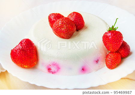 Delicious homemade cake dessert cream with strawberries on a white plate, exquisite sweet food 95469987