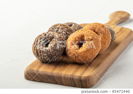 Donuts on a chopping board Donuts on a chopping board 95471440