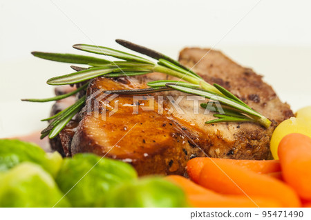 ham pork carrots, potatoes and brussels sprouts on white background ham pork carrots, potatoes and brussels sprouts on white background 95471490