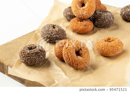donuts on a cutting board donuts on a cutting board 95471521