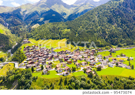 Aerial view of Curaglia village. Switzerland Aerial view of Curaglia village. Switzerland 95473074