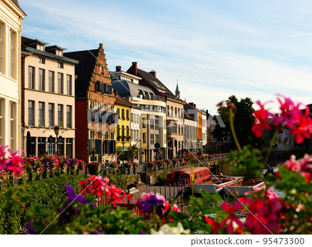 Summer view of Ghent with typical Flemish townhouses on banks of river Leie 95473300