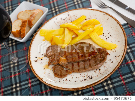 Traditional spanish grilled beef with potato Traditional spanish grilled beef with potato 95473675