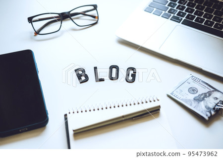 How To Start Blog, Blogging for Beginners. Ways to monetize your blog. Blog word on table with laptop, smartphone, open notebook, dollar banknotes and glasses How To Start Blog, Blogging for Beginners. Ways to monetize your blog. Blog word on table with laptop, smartphone, open notebook, dollar banknotes and glasses 95473962