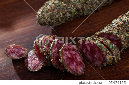 Catalan sausage fuet in herbs Catalan sausage fuet in herbs 95474155
