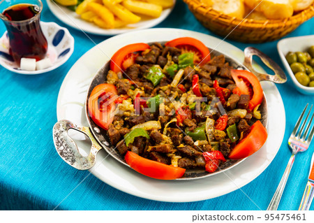 Turkish meat dish called Sach Kavurma. 95475461