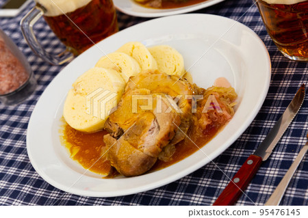 Knodels, pork and sauerkraut Knodels, pork and sauerkraut 95476145