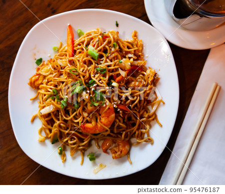 Shrimp noodles with teriyaki sauce 95476187
