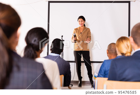 Portrait of woman speaker at business conference Portrait of woman speaker at business conference 95476585