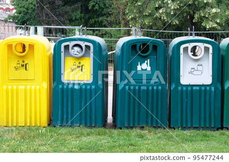 Waste recycling concept. Containers for metal, glass, paper, plastic for further processing of garbage. Separate garbage collection. Waste recycling concept. Containers for metal, glass, paper, plastic for further processing of garbage. Separate garbage collection. 95477244