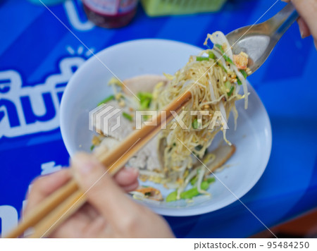 Dried egg noodles with pork without soup Asian food style Dried egg noodles with pork without soup Asian food style 95484250