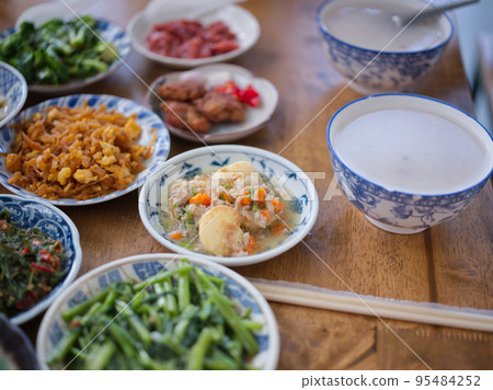 Rice gruel and side dish . Concept breakfast THAI STYLE 95484252