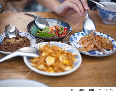 Rice gruel and side dish . Concept breakfast THAI STYLE 95484260