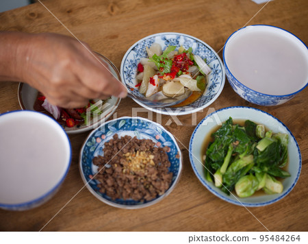 Rice gruel and side dish . Concept breakfast THAI STYLE 95484264
