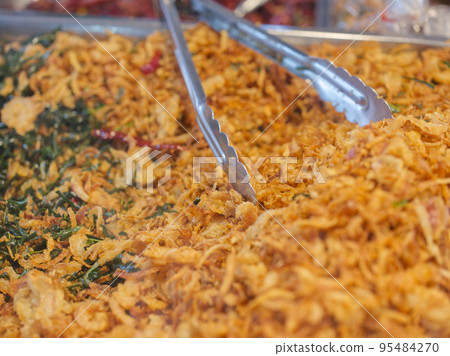 Deep fried pickled fish (Sour crispy fish) . Famous appetizer menu in THAILAND market. 95484270