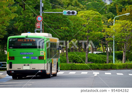 Toei bus bound for Nishikasai Station departing from the bus stop (rear view) 95484282